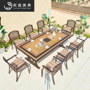 Открытый двор столы и стулья для барбекю из литого алюминия, сад на вилле, домашняя терраса под открытым небом для отдыха Изображение
